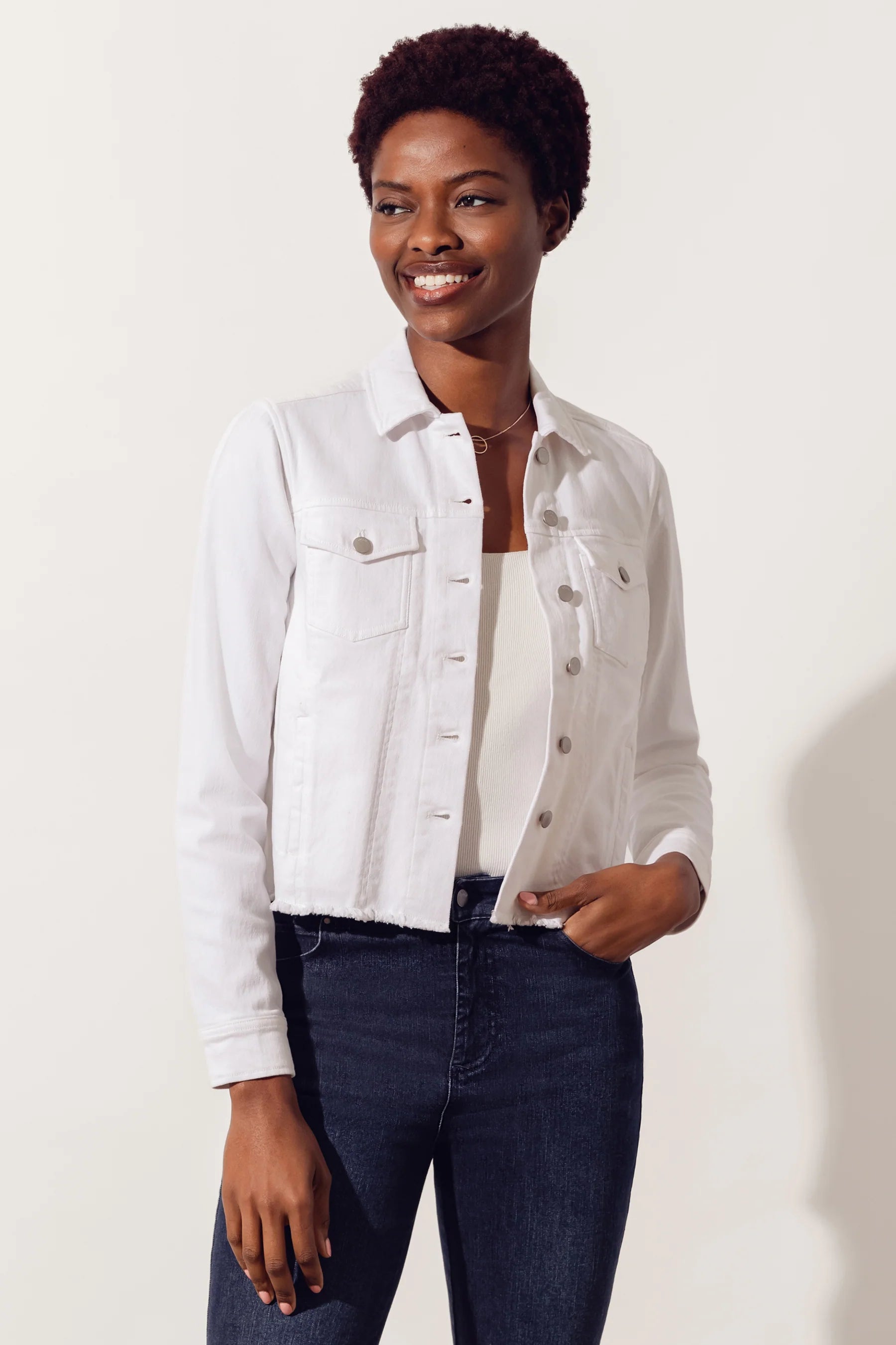 Fashion beautiful young woman, girl wearing blank white cotton T-shirt, denim  jacket and jeans.Young female teenager model posing, standing by chair.  Jeans concept. model tests. Stock Photo | Adobe Stock